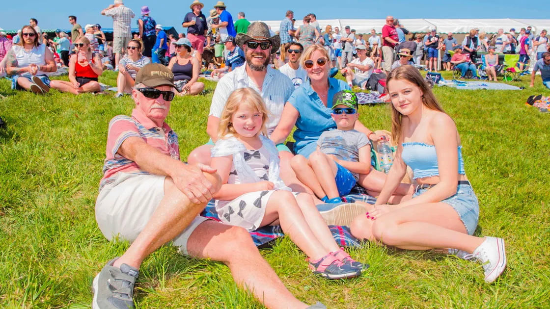 The bumper L'Ancresse crowd included, left to right, Derek Dodd, Alison Dodd, Turk, Rocco Nicole, 6, Frankie Torode, 7, and Megan Nicole, 13. (Picture by Ben Fiore, 21391575)