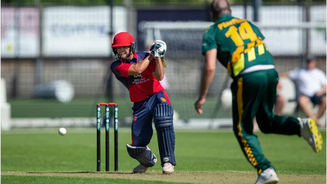 Jonty Jenner drives Will Peatfield on his way to a brilliant inter-insular hundred for Jersey at the KGV. www.guernseysportphotography.com, 32488589)