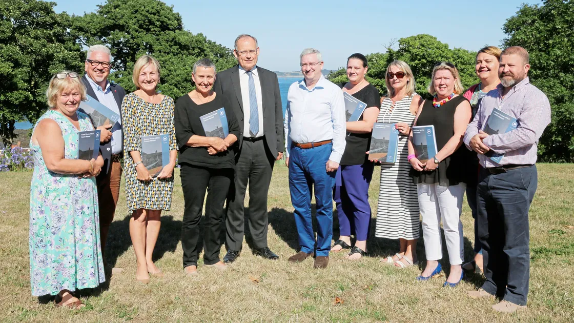 After the two-day ‘first aid’ mental health course, those who were involved were presented with a certificate by Bailiff Sir Richard Collas. Left to right: Janet Wyatt, Calum Le Noury, Kaaren Welsby, Marlene Place, Sir Richard, trainer Mark Perryman, Janice Bedford, Terri Malon, Ceri Powell, Isabelle Blake and David Knight.                   (Picture by Adrian Miller, 22178244)