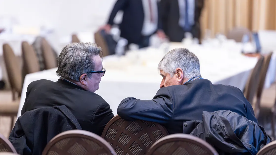 St Martin’s constable and former deputy Rob Prow, right, pictured talking to Deputy John Gollop during the Island Development Plan hearing at St Pierre Park Hotel