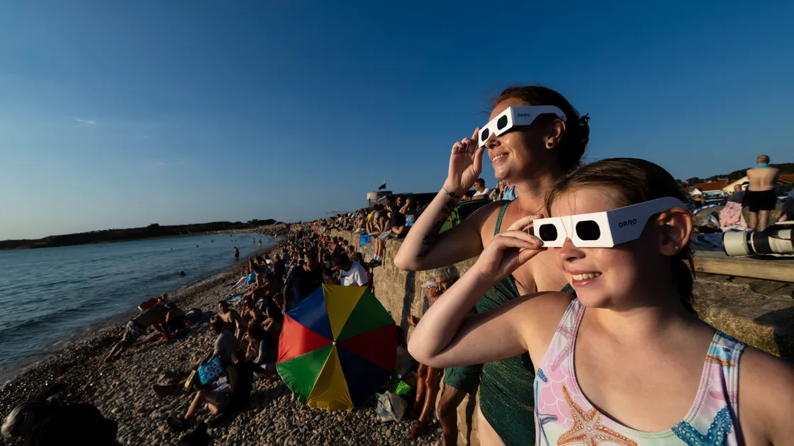 Those with much sought-after solar glasses saw the peak of the eclipse at just after 7.15pm.