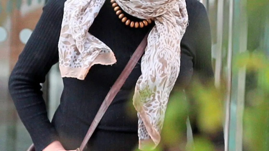 Jessica Sinclair, 45, covered her face as she left the Royal Court after receiving a suspended sentence for possessing and making an explosive black powder in suspicious circumstances and without a legal reason, either in Guernsey or elsewhere.                                             (Picture by Adrian Miller, 21302015)