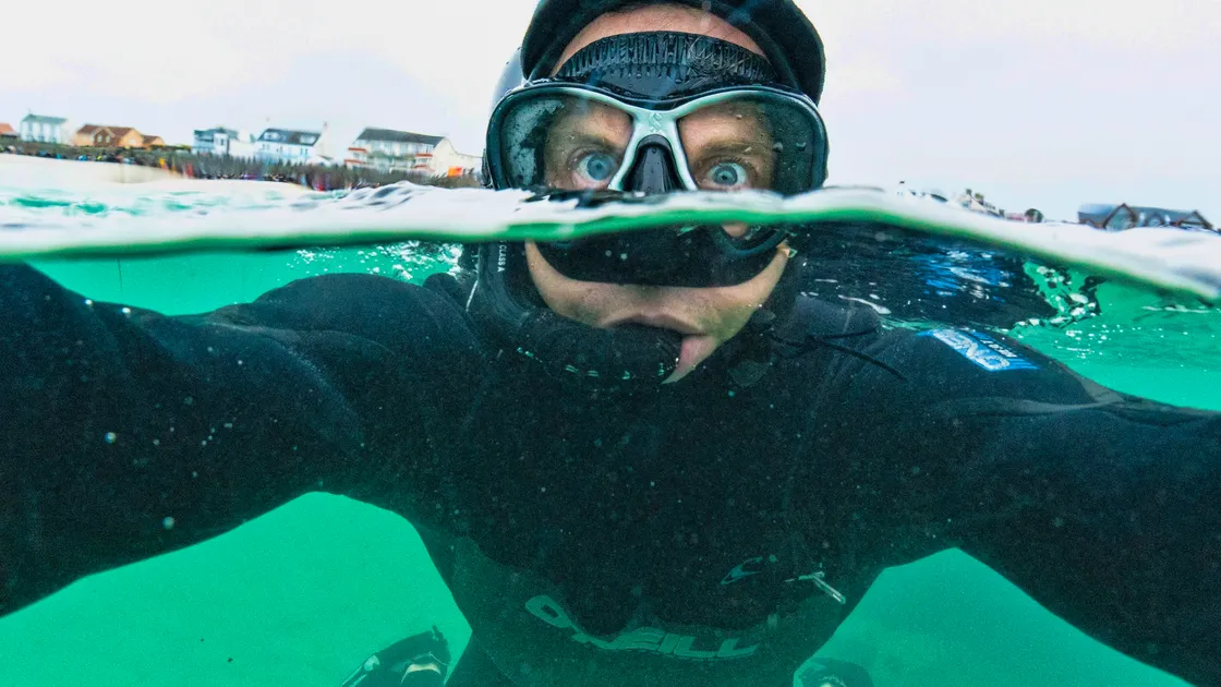 Photographer Peter Frankland donned a 6mm hooded wetsuit for this swim selfie. (29059369)