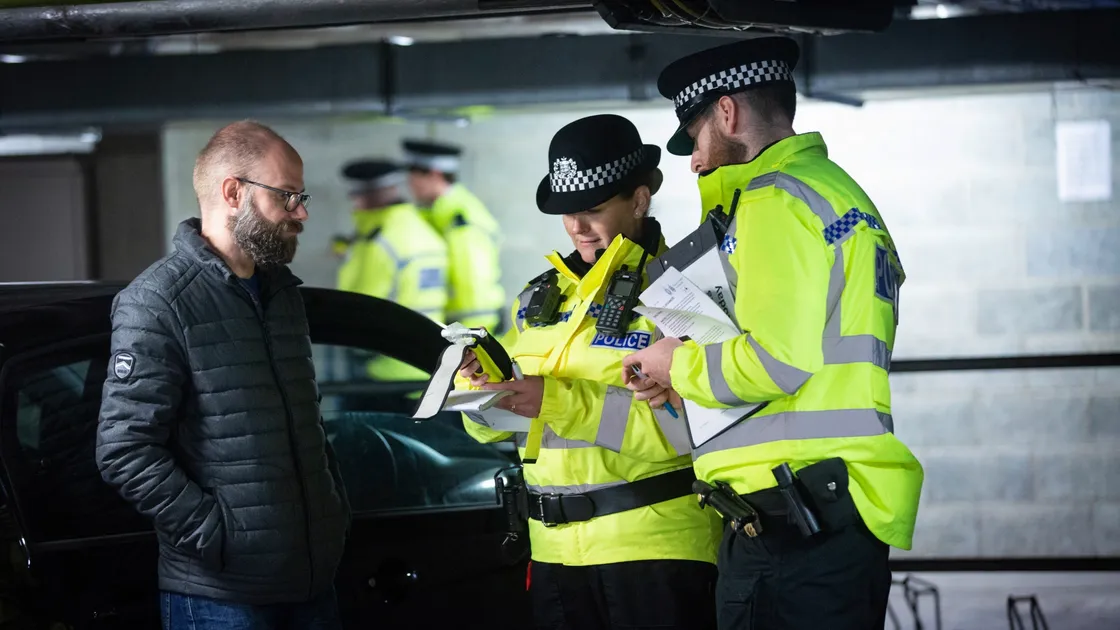 Guernsey Police officers were carrying out drink driving checks for training with student officers at the former RBC building. Left to right: Sgt Carl Donnelly (as motorist), student officer Jeanine Taylor and PC Matt Le Page. (Picture by Peter Frankland, 29026665)