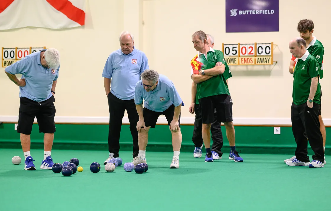 Steve Le Noury takes a peak over a Jersey opponent’s shoulder during the men’s fours final in which three Le Nourys joined forces with Gary Pitschou to claim the title for Guernsey