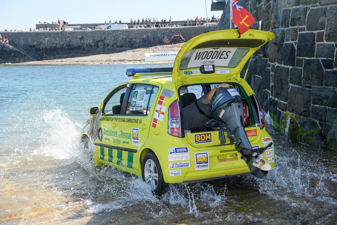 The car, which has been modified to float, dipped into the sea from the old lifeboat slipway on Castle Emplacement.