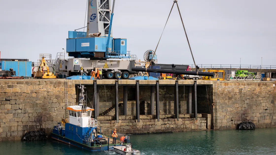 The Sarnia work boat was called upon to help guide the piles back into place as they were lowered by a crane. 