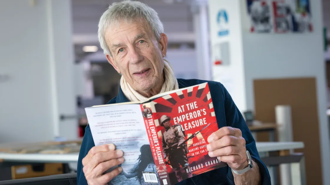 Richard Graham with the book he waited 60 years to write – At The Emperor’s Pleasure.