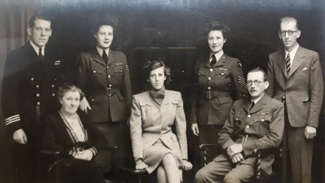 Jeanne Le Messurier Mitchell pictured centre with her family after the end of the war.
