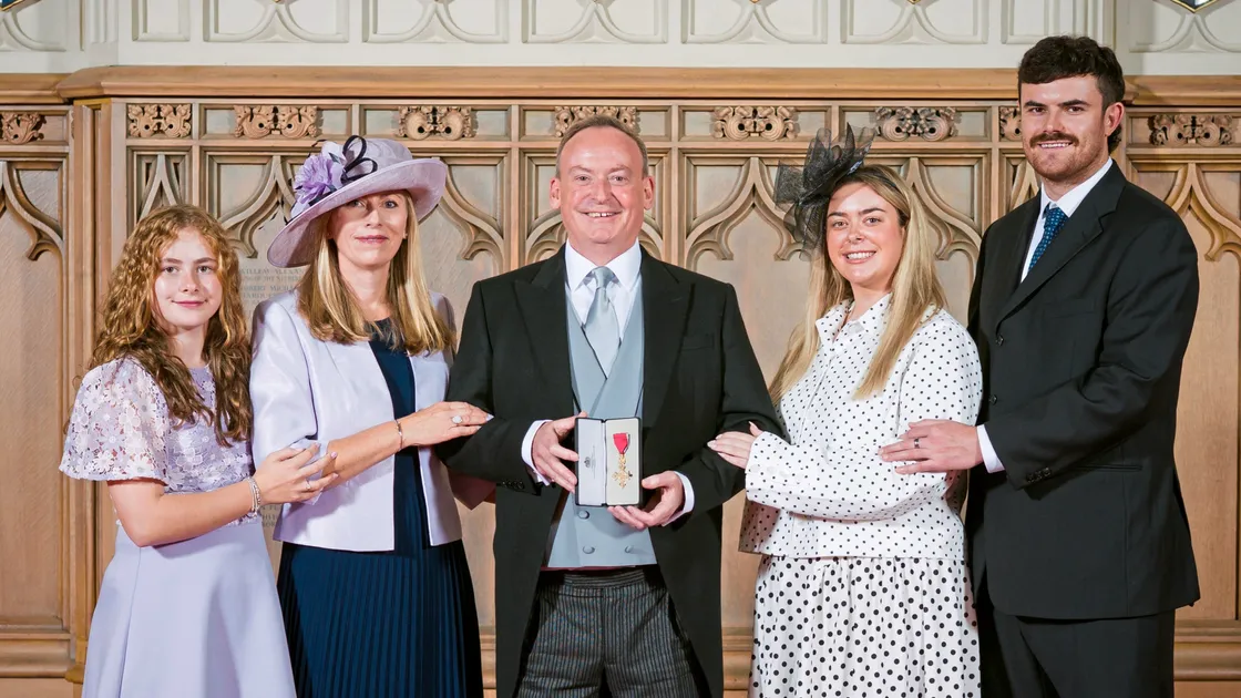 The Trott family at Windsor Castle as Lyndon receives the OBE from the Prince of Wales. From left to right, Seren, Karen, Lyndon, Jodie and Jack