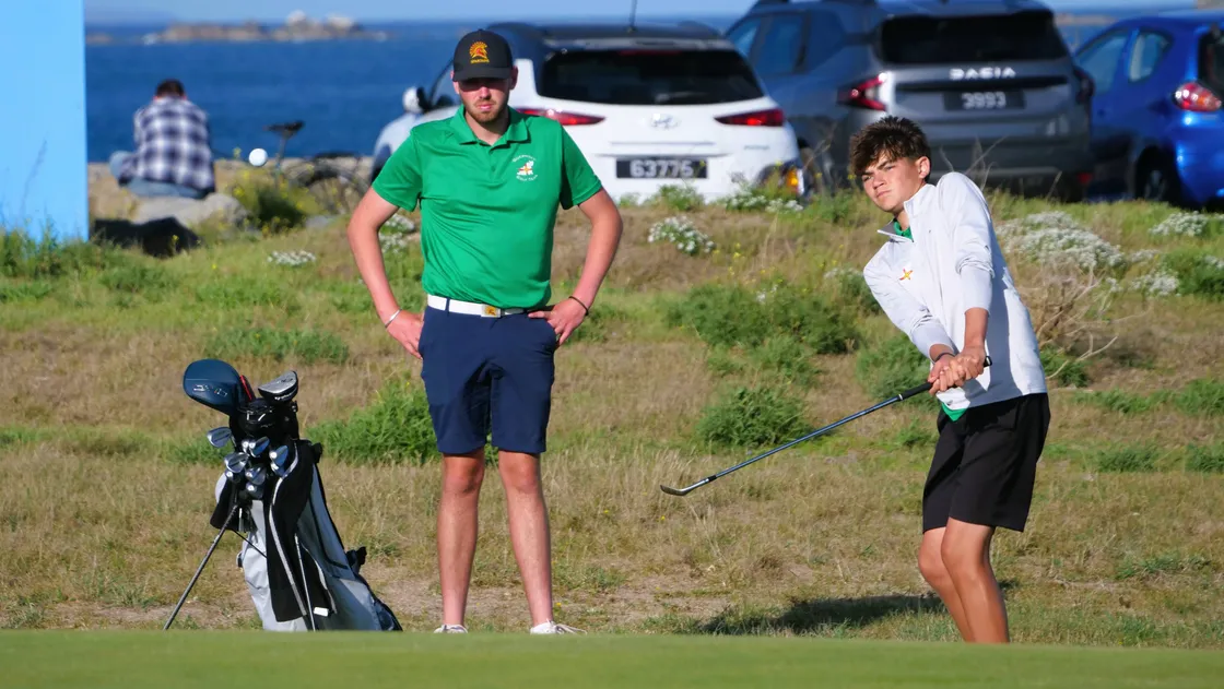 Guernsey debutant Josh Neville, pictured with caddie Rory McKenna, partnered both Jamie and Danny Blondel in opening day victories.