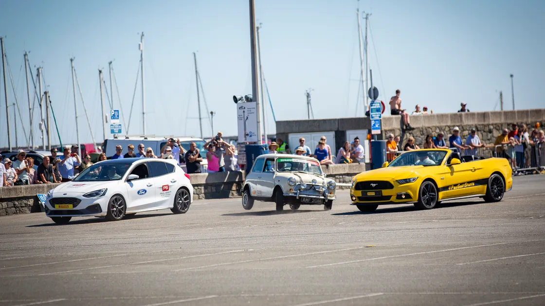 How to park a Mini in a tight parking space on two wheels the Paul Swift way.(31019608)