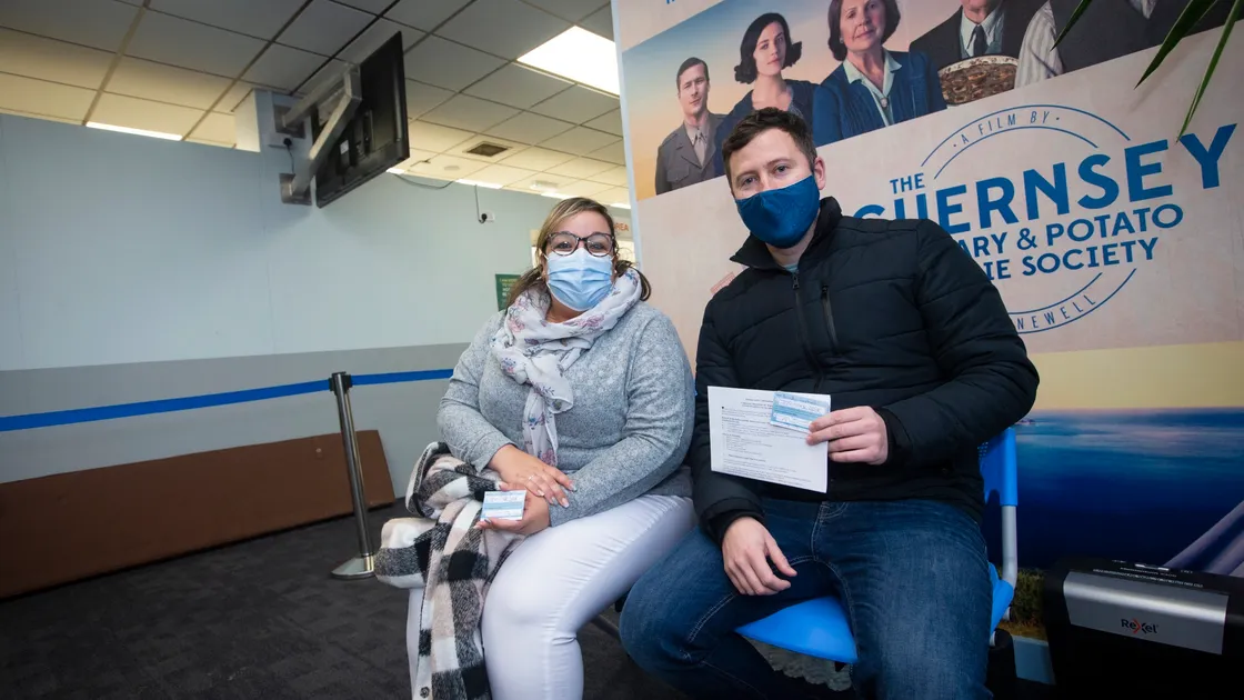 Nicole De Sousa and Brady Lesbirel at the White Rock ferry terminal which is trialling as a temporary drop-in vaccine centre. (Picture by Peter Frankland, 30427536)