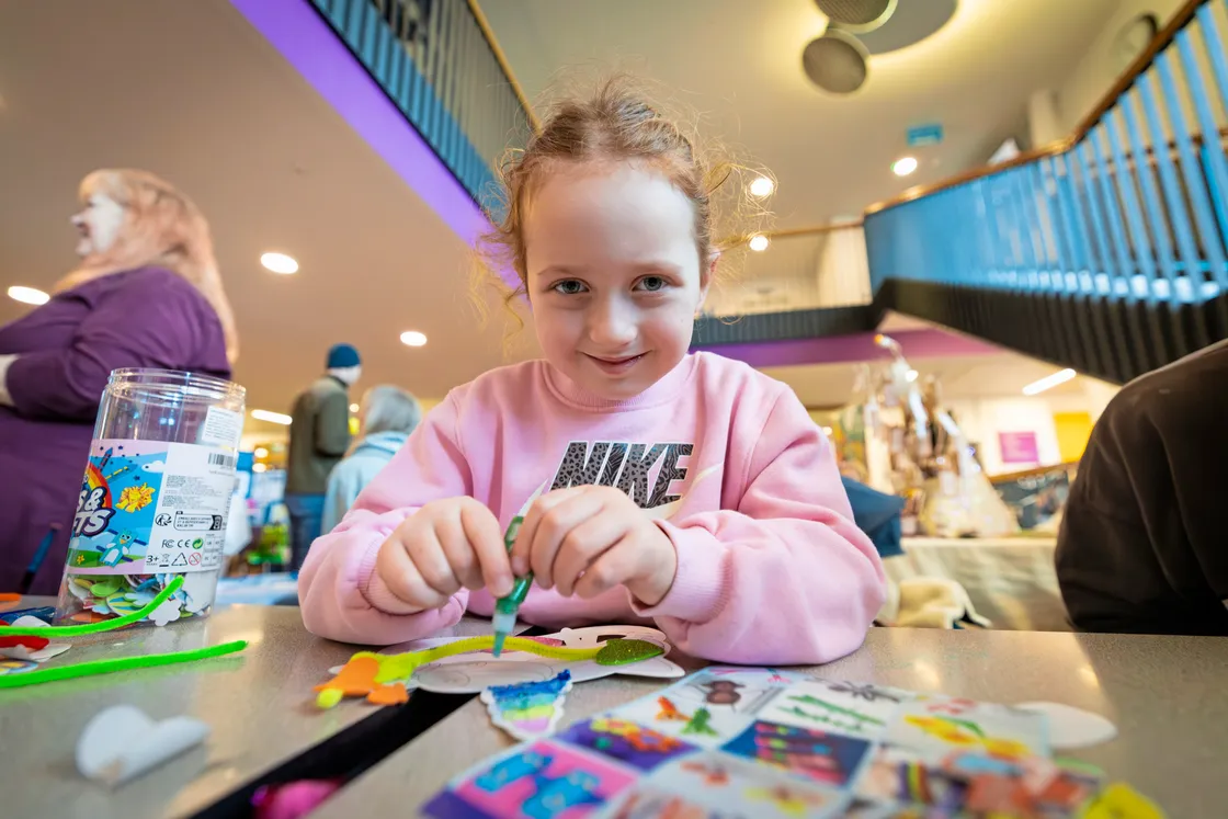 Lyla Roland, 5, colouring a mask