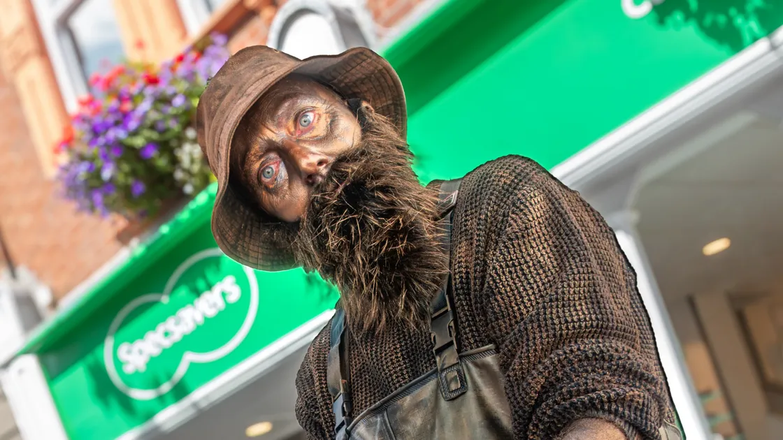 Cheshire Home Jimmy Ozanne as a bronze fisherman statue at the Guernsey Street Festival 2026.