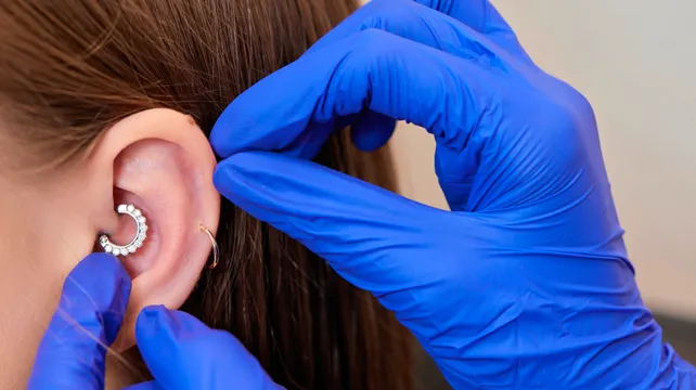States to debate relaxing body piercing law for teens