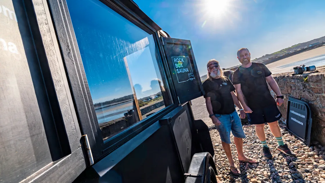 Nigel Gale of Guernsey Glazing, left, and Sandy Lawson who owns the Rock Box Sauna