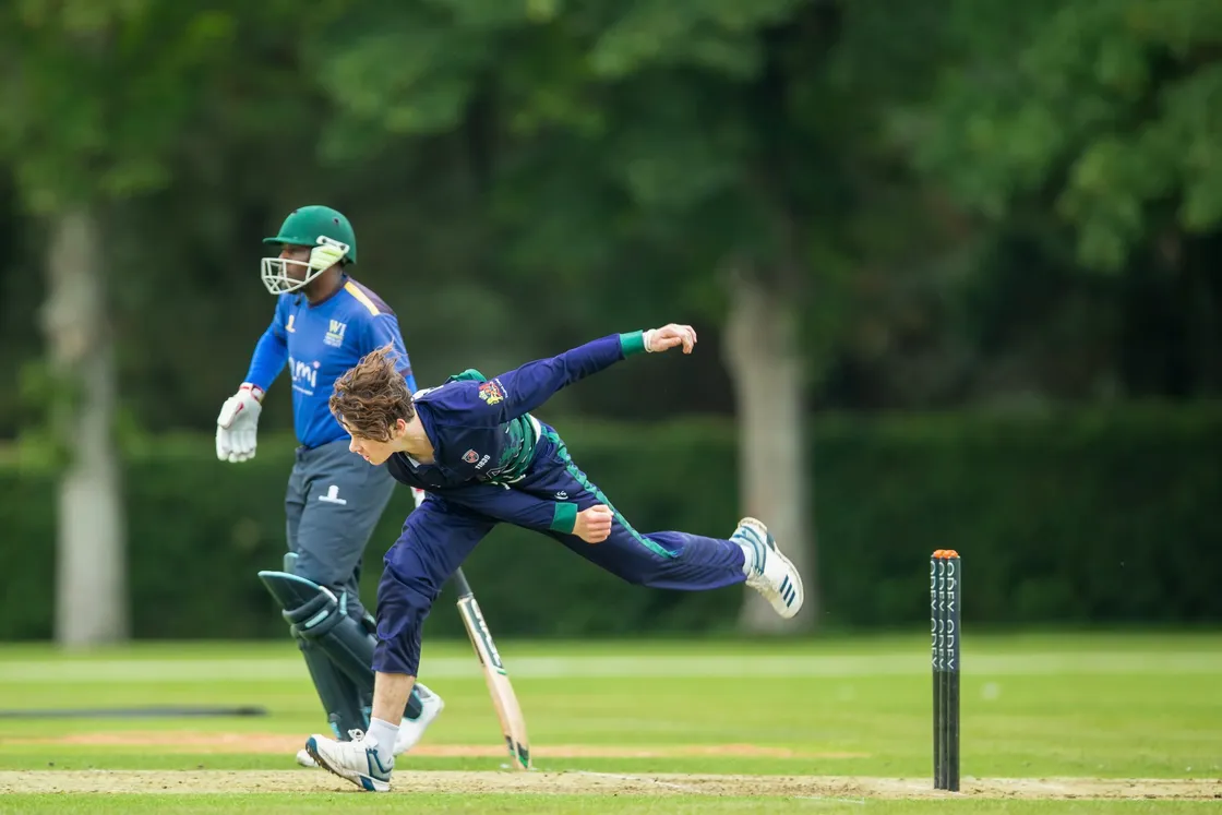 OEA's Charlie Birch bowling at the College Field. Gashirai Masvikeni is the Wanderers-Irregulars batsman. (Picture by Martin Gray, 29675665)
