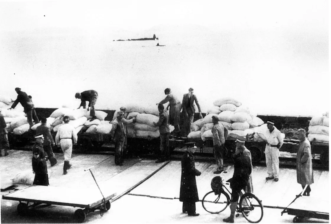 At great risk, Reg took covert photos of German activity on his Zeiss camera, such as this image of relief parcels being unloaded from the SS Vega in St Peter Port