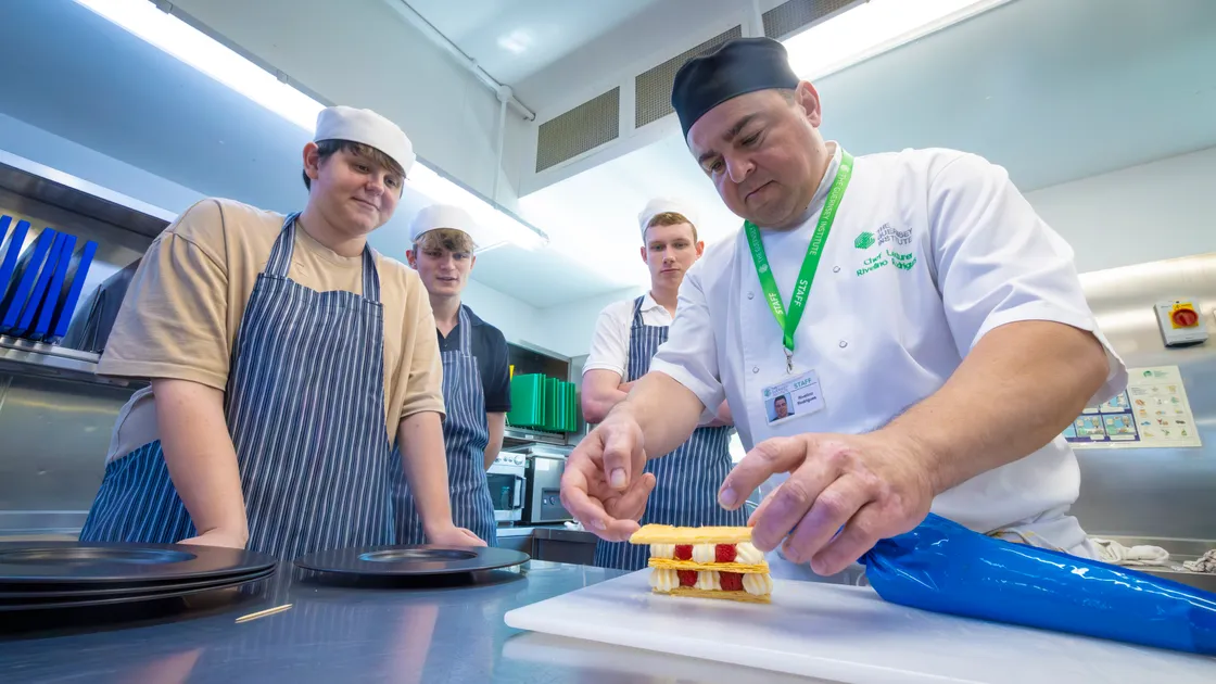 Left to right, Harry Leivars, Ethan O’Reilly and George Thoumine getting a demo from lecturer Rivelino Rodrigues. (Picture by Peter Frankland, 34764808)