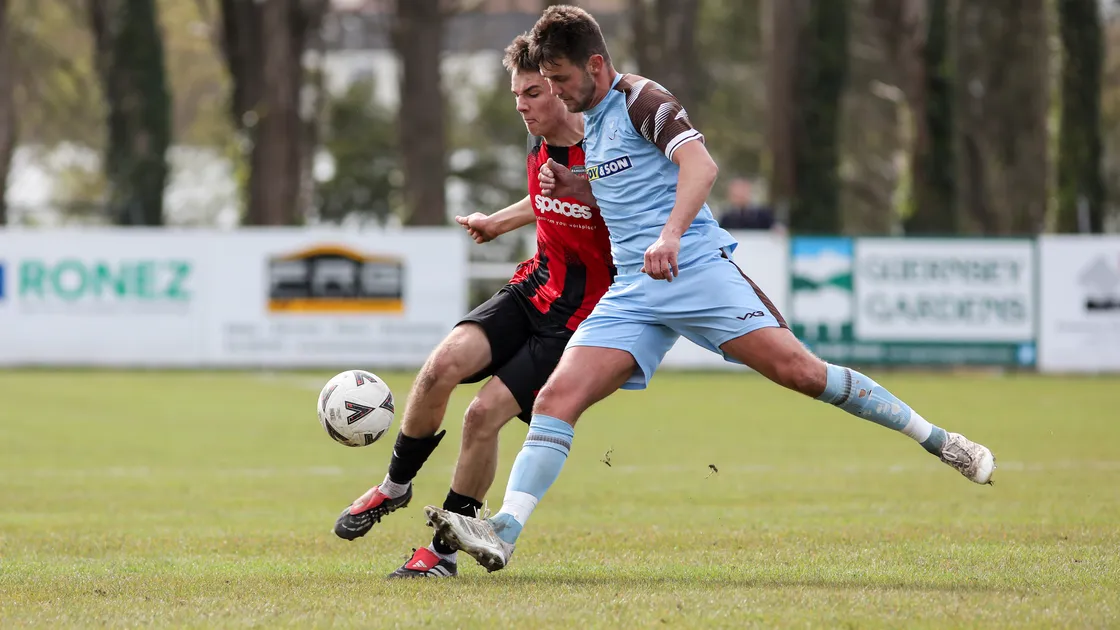 Ryan Lamb, the scorer of two goals for North, challenges a Rangers opponent for the ball on Saturday at Northfield.