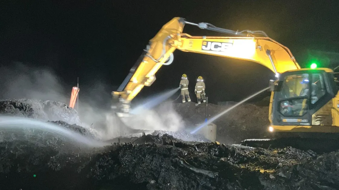 Firefighters tackle the blaze at Mont Cuet landfill site on Monday evening. 				 (Picture by Guernsey Fire & Rescue Service)