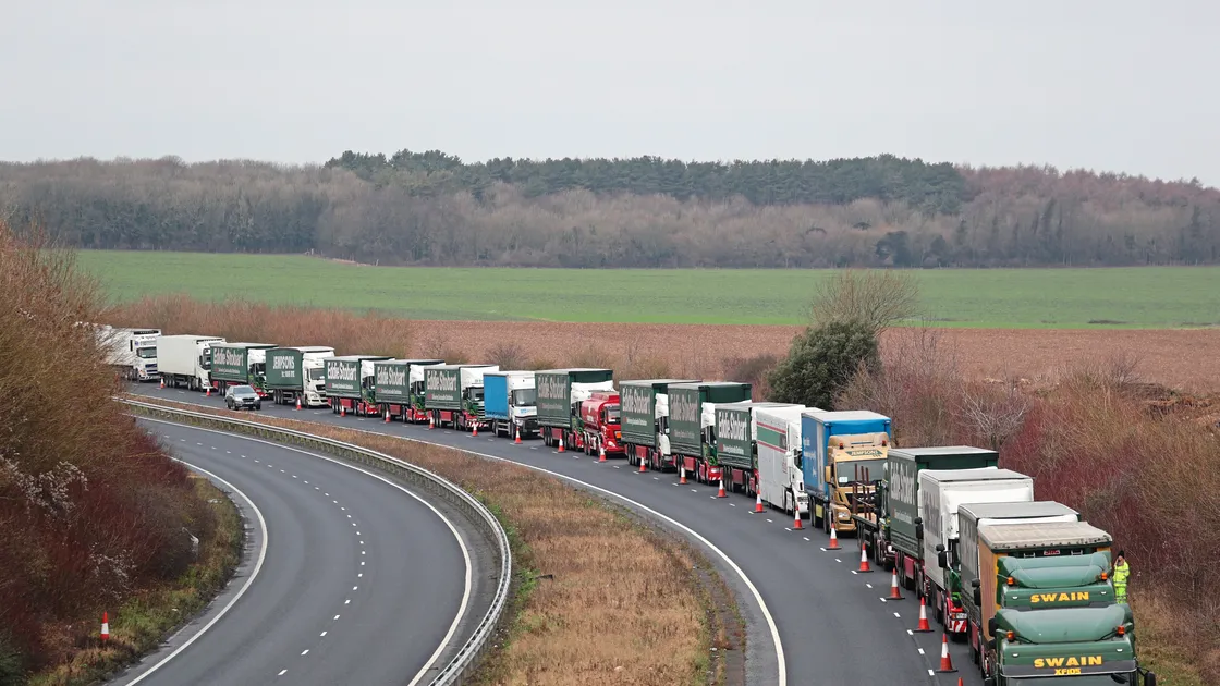 Lorries line up on the A256 outside Dover for the second of two trials at the former Manston Airport site in Kent of a government plan to hold vehicles in the event of post-Brexit disruption at the Channel ports. (Picture: PA Gareth Fuller)