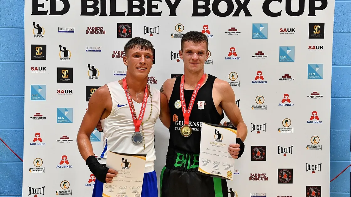 Emile Prevel, right, after beating Brandon Clifford to win his gold.