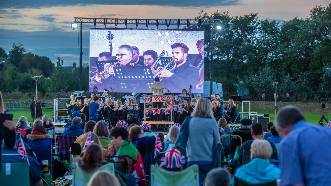 The Guernsey Symphonic Wind Band performance is shown on the big screen at the KGV which later showed the second half of the Last Night of the Proms from the Royal Albert Hall. (Pictures by Peter Frankland, 29978184)
