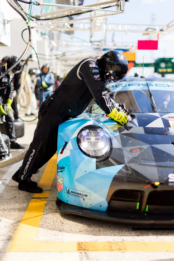 The Proton-Dempsey mechanics worked for more than 20 minutes to get the car back on track after the late suspension issue. (Picture by Harry Parvin/focuspackmedia.com)