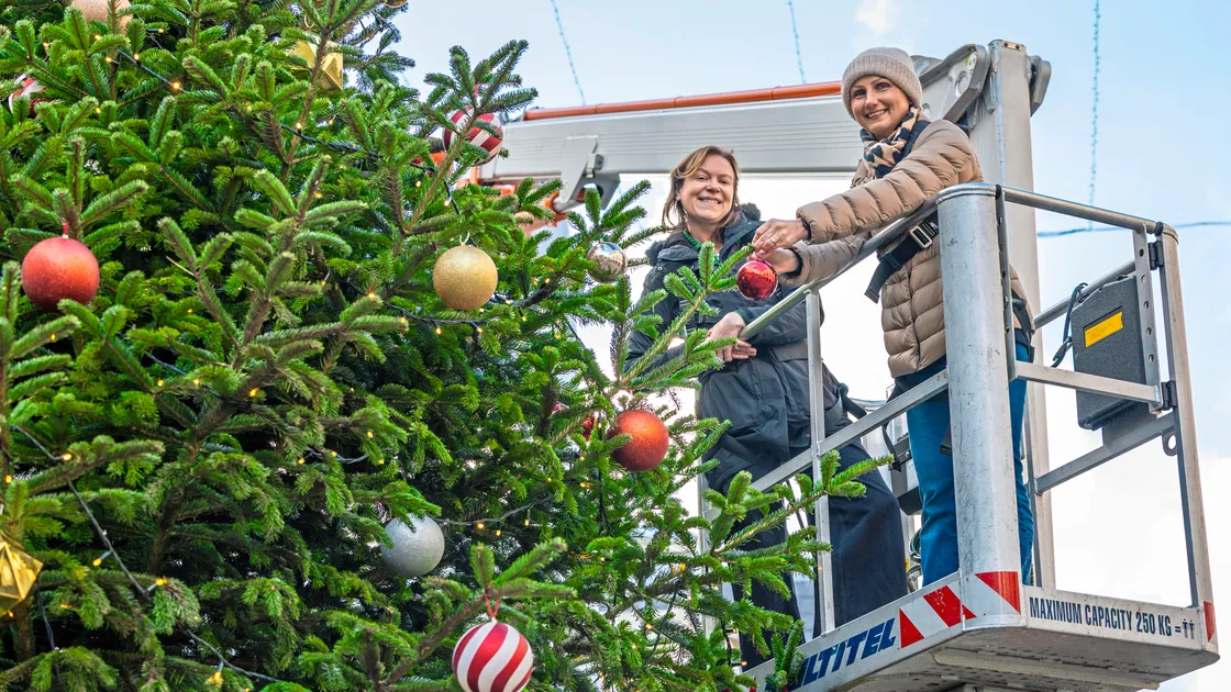 Sure has sponsored this year’s Christmas tree in Market Square and brand PR and communications manager Emmily Rowlinson, left, and brand lead Gemma Ainger were on hand to help decorate it