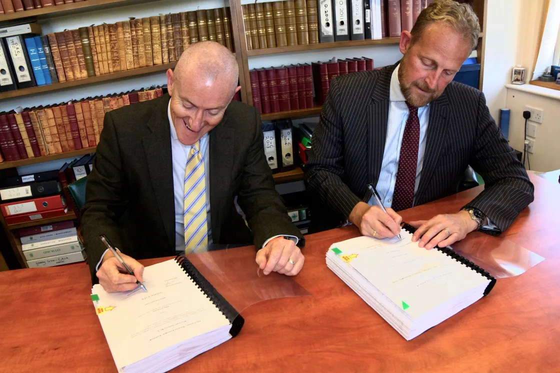 Chief executive of Agilisys Guernsey Richard Hanrahan, left, with the chief executive of the States of Guernsey, Paul Whitfield, signing the formal contract to enable Agilisys in 2019. (33984762)