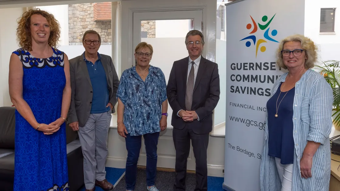 Bailiff Richard McMahon, second right, is patron of Guernsey Community Savings (29878312)