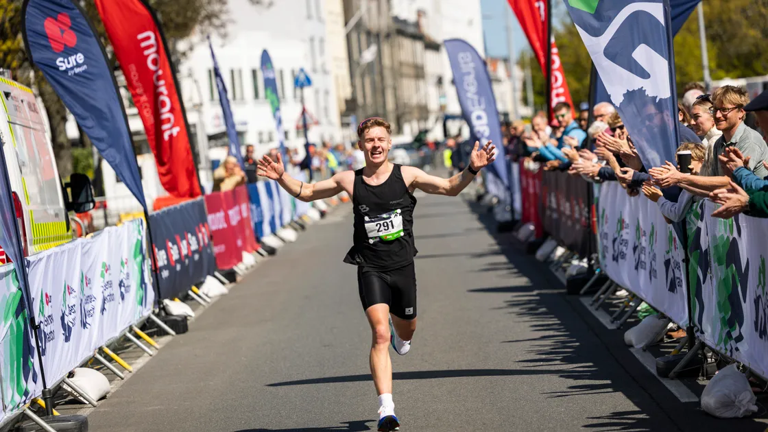Ethan Woodhead was the first Guernseyman to cross the finish line at the Sure Guernsey Marathon, with a personal best of 2-33-52.