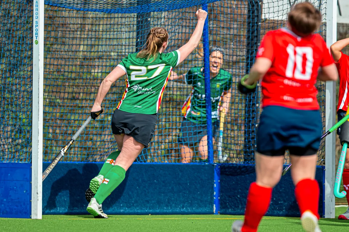 Becky McAllister celebrates as Lucy Waldrom scores the opener for Guernsey.