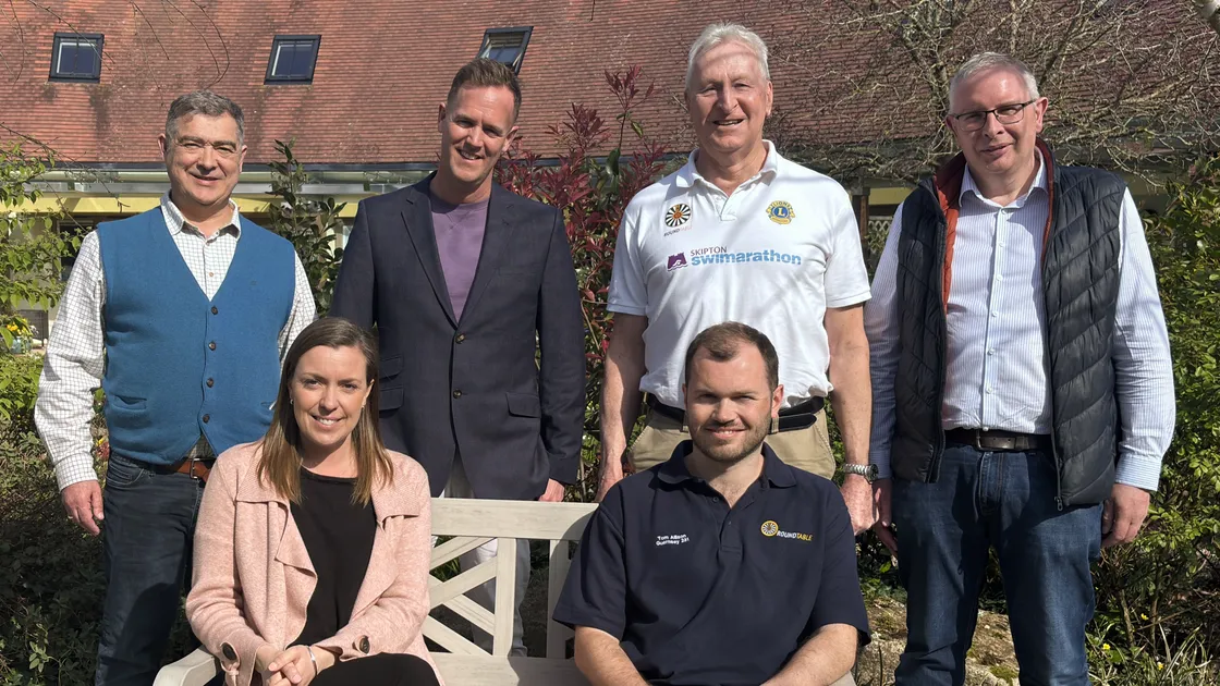 Left to right: Les Bourgs Hospice CEO Rob Jones, Fenella Comeskey and Pete Turner from Skipton International, Skipton Swimarathon organising committee chairman John Stuart, Guernsey Round Table president Tom Allison, and president of Lions Club of Guernsey John McLoughlin.