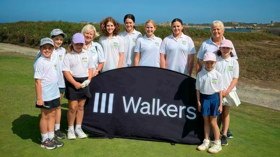Some of the members of Girls Into Golf Squad with Angela Goddard, fourth from left, and Helen Banks, back right
