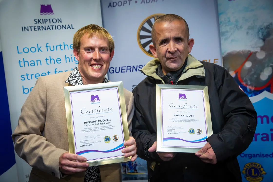 Special certificates to mark the major fundraising efforts of Richard Coomer, left, and Karl Enticott. (30086835)