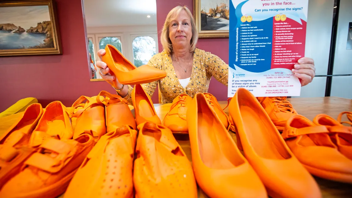 Cathy Bailey is a member of Soroptimist International Guernsey, which is joining other Soroptimist groups across the world taking action and calling for the elimination of violence against women. Shoes sprayed orange will be placed on Market Steps this weekend to highlight the campaign. (Picture by Peter Frankland, 33801837)