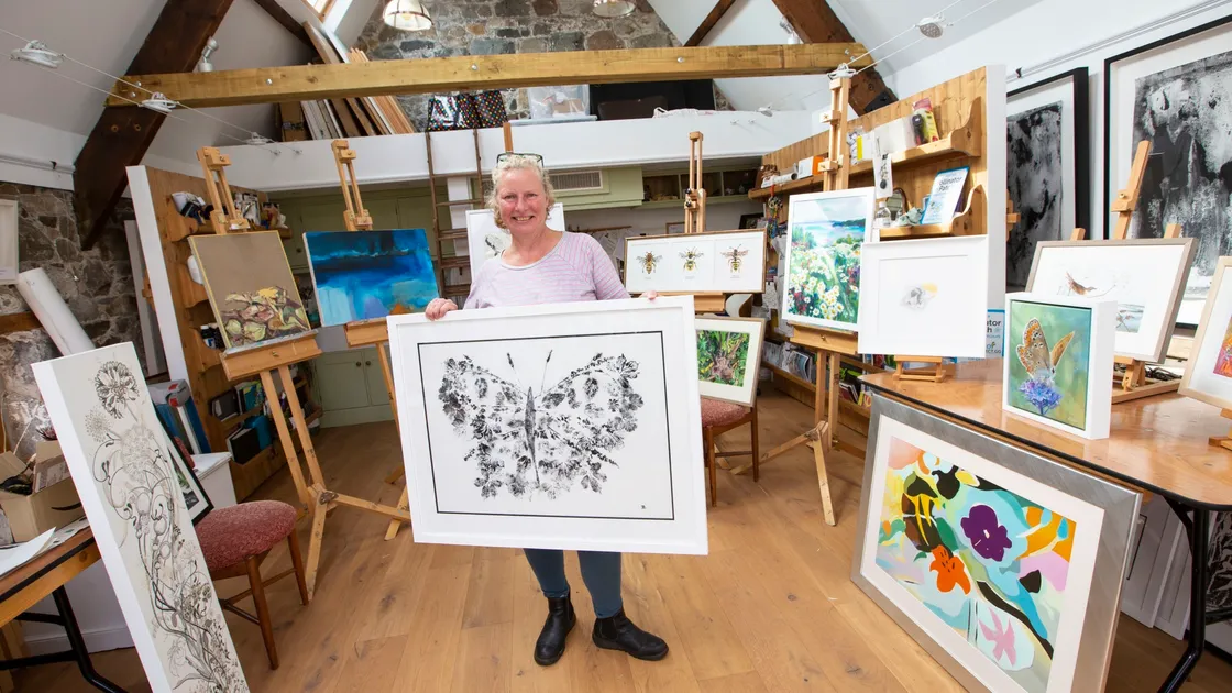 Bridget Spinney with some of the artwork which is to be exhibited and then sold at auction to raise money for The Pollinator Project and Les Bourgs Hospice. (Picture by Peter Frankland, 30069422)