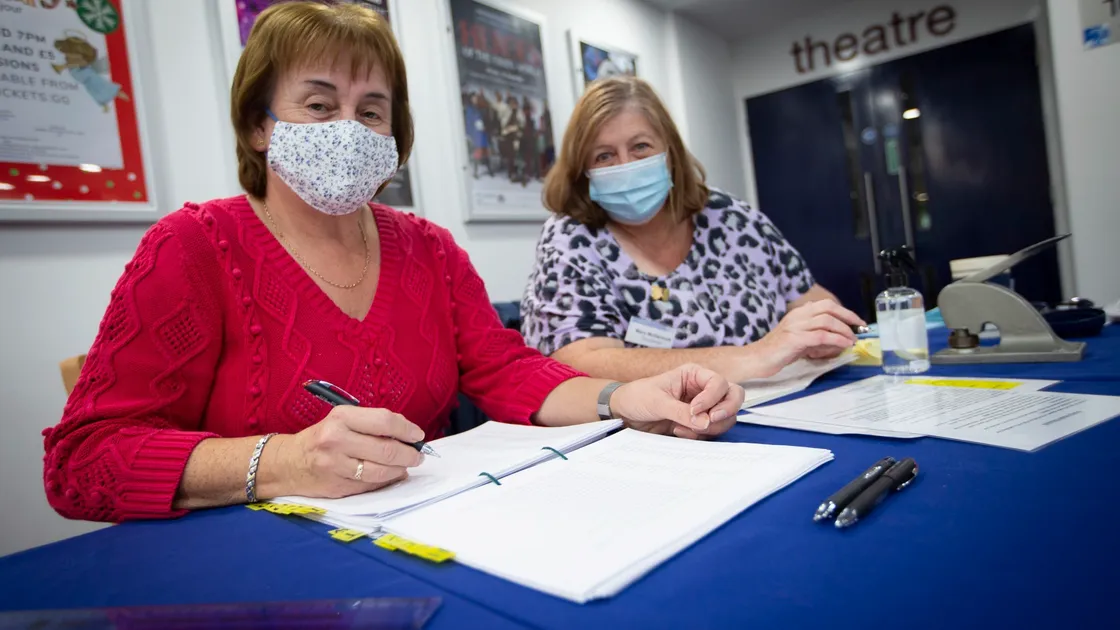 Manning the polling station at Beau Sejour were Di Lihou, left, and Mandy McDermott. (Picture By Peter Frankland, 30210379)