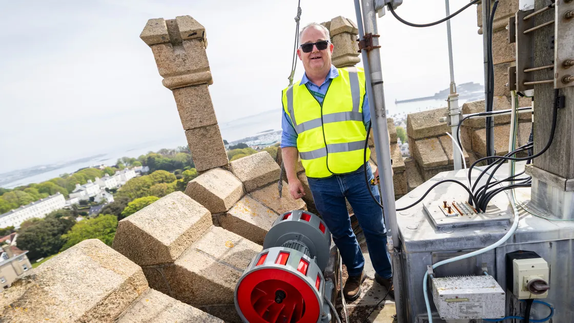Jason Dodd from the States Property Unit with the new air raid siren that was fitted at the top of Victoria Tower this weekend. 										 (Picture by Sophie Rabey, 34724716)