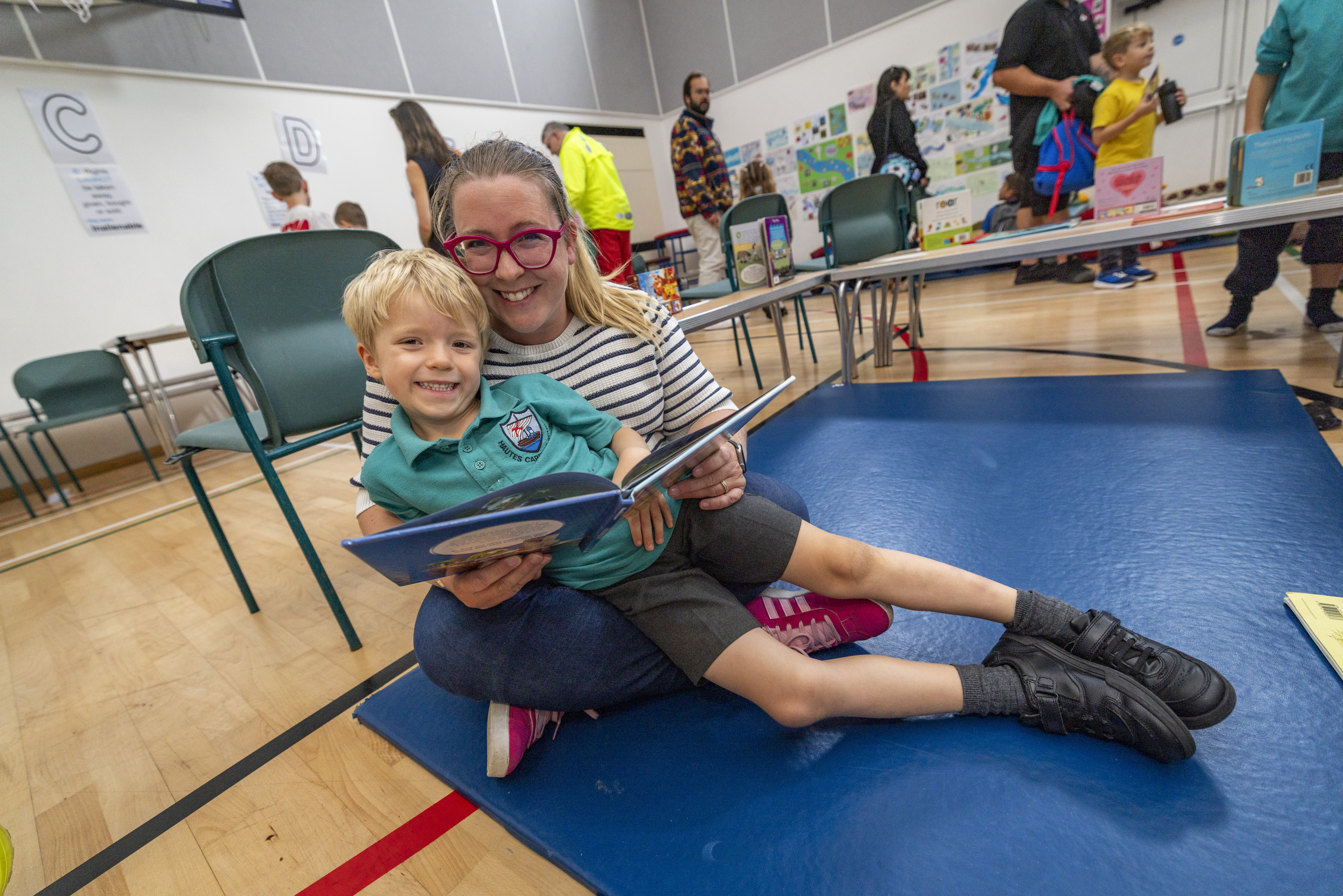 Families enjoy a book and a cuppa at school’s reading cafe