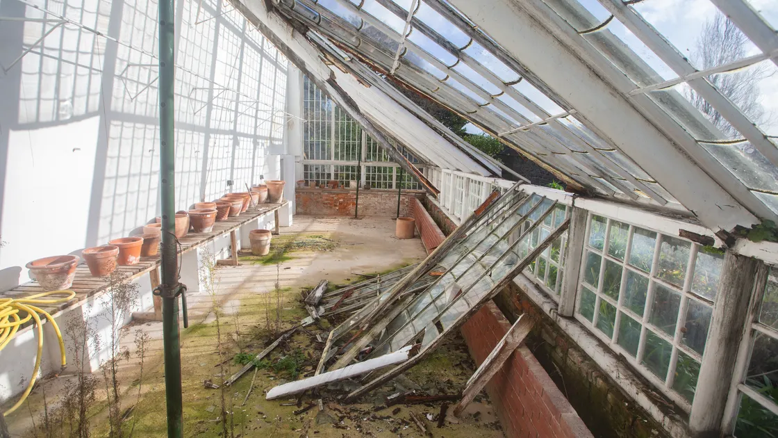 Part of the roof of the historic lower glasshouse at Candie Gardens has collapsed and both it and the upper glasshouse are in need of repair, which is the responsibility of the States.  (Picture by Peter Frankland, 31658871)