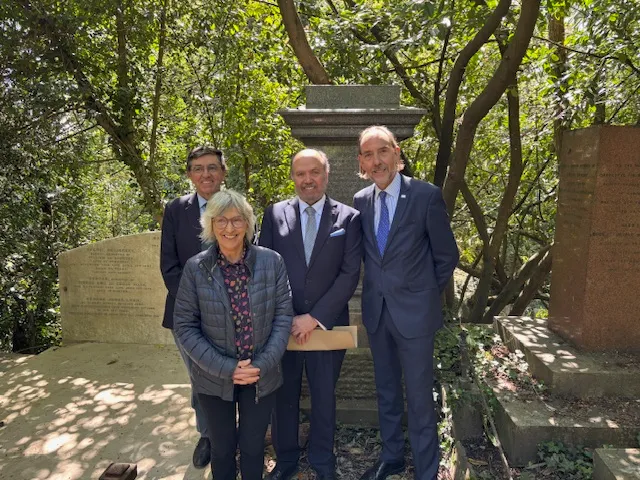 L-R: Guernsey Society chairman Keith Le Page, fundraising campaigner Marguerite Talmage, Ambassador Rafael Ortiz Fabrega and States of Guernsey external relations lead Steve Falla, at William Le Lacheur's graveside