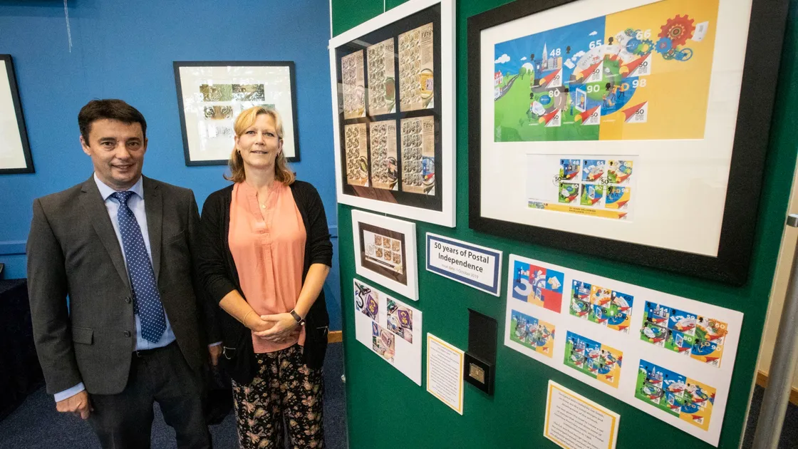 Boley Smillie, chief executive at Guernsey Post, and head of philatelic Bridget Yabsley at St James where a free exhibition of stamps and artwork marks the 50th anniversary of postal independence. (Picture by Sophie Rabey, 25951115)