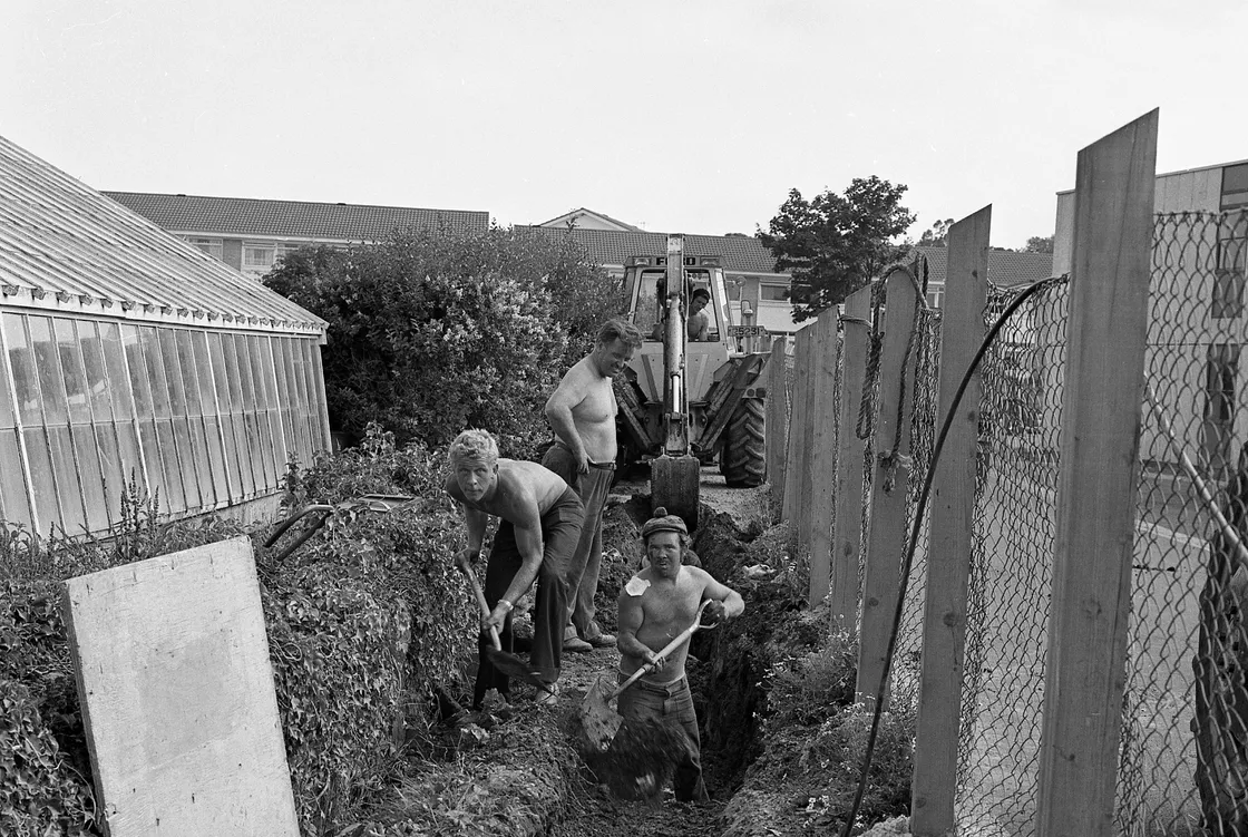 Workmen laying pipes to increase the abstraction rate from the La Mare de Carteret pumping station.