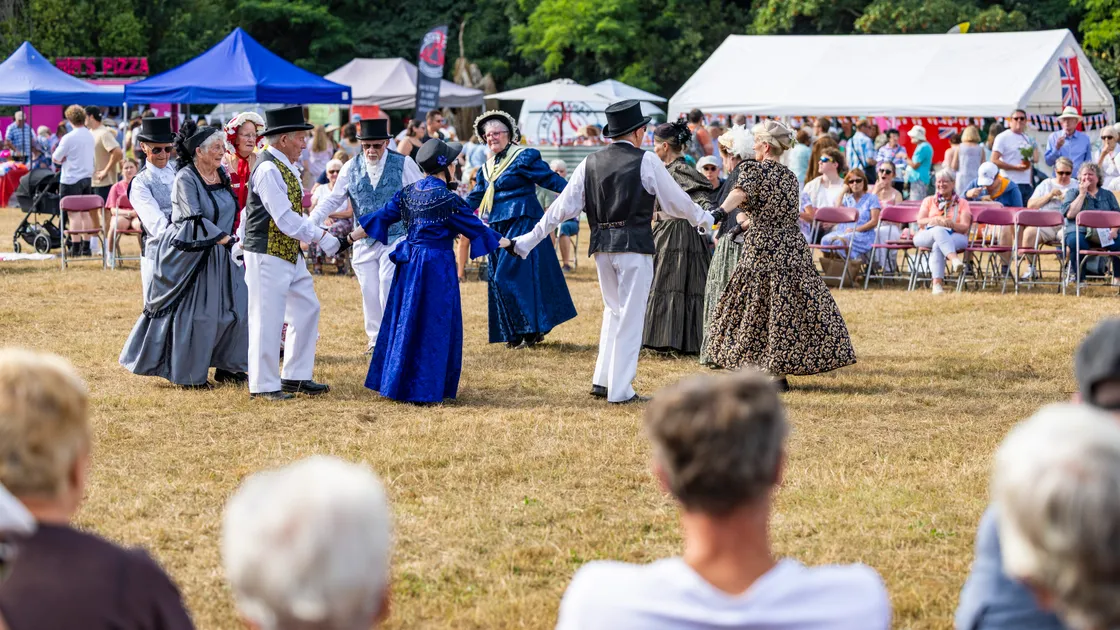 Traditional Guernsey dancers from Assemblaie Guernesiaise at Le Viaer Marchi in Saumarez Park.