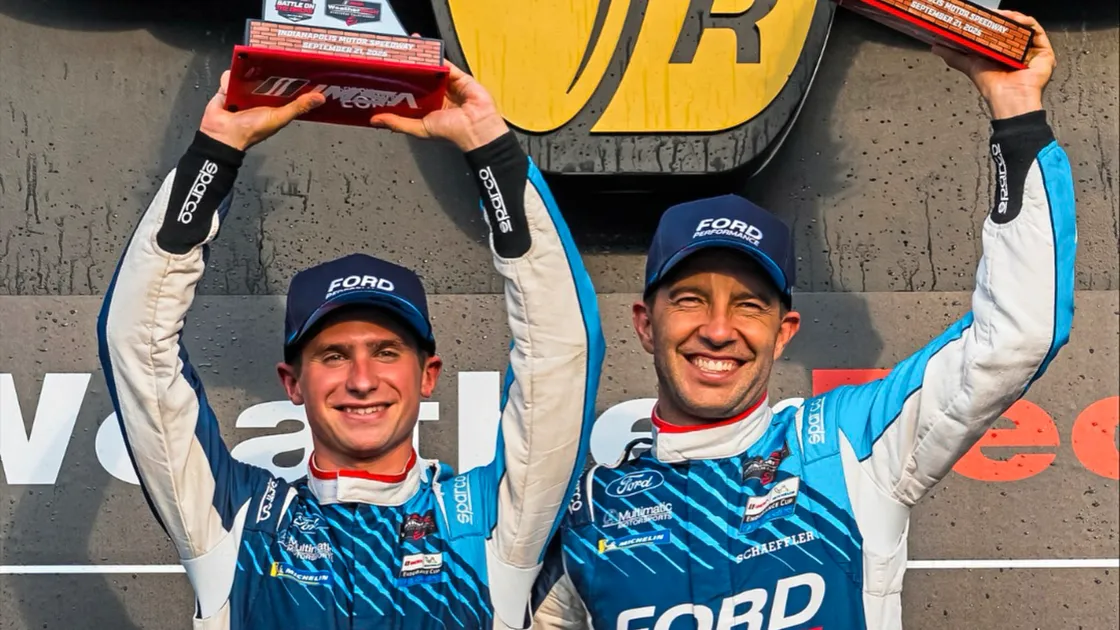 Seb Priaulx, left, and Mike Rockenfeller on top of the podium on Sunday