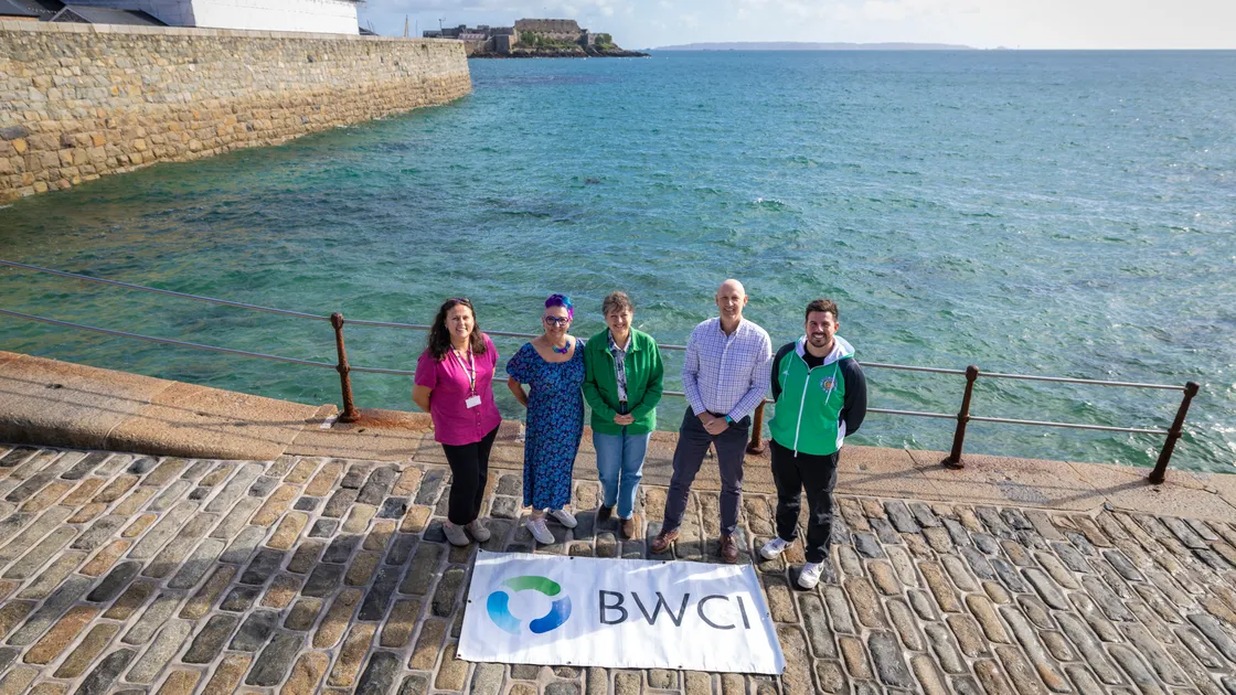 The Guernsey Swimming Club handed £2,400 each to three charities – Guernsey Mind, Safer Guernsey and the Guernsey Voluntary Service – following this year’s BWCI Open Castle Swim. Left to right: Safer Guernsey’s Linda Norman, Guernsey Voluntary Service’s Mandy Le Bachelet, Guernsey Mind’s Jo Cottell, BWCI’s Jonathan Kemp and Kevin Penney of the swimming club. 	